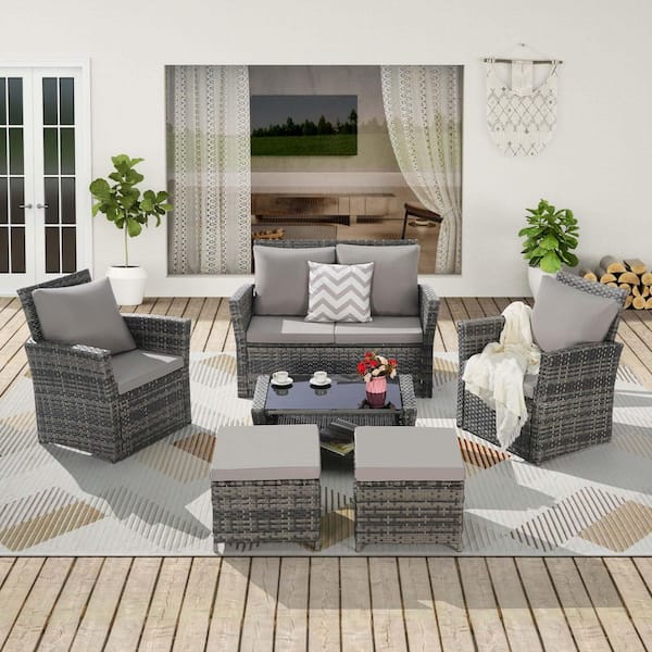Tenleaf 6-Piece Wicker Patio Conversation Set with Light Gray Cushions, Ottoman and Tempered Glass Coffee Table