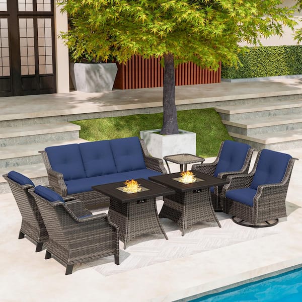 MeetLeisure 8-Piece 7-Seat Wicker Patio Conversation Set Fire Pit Table with Swivel Rocking Chairs and Blue Cushion
