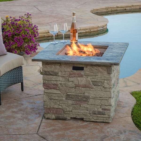 Propane stone outlet fire pit