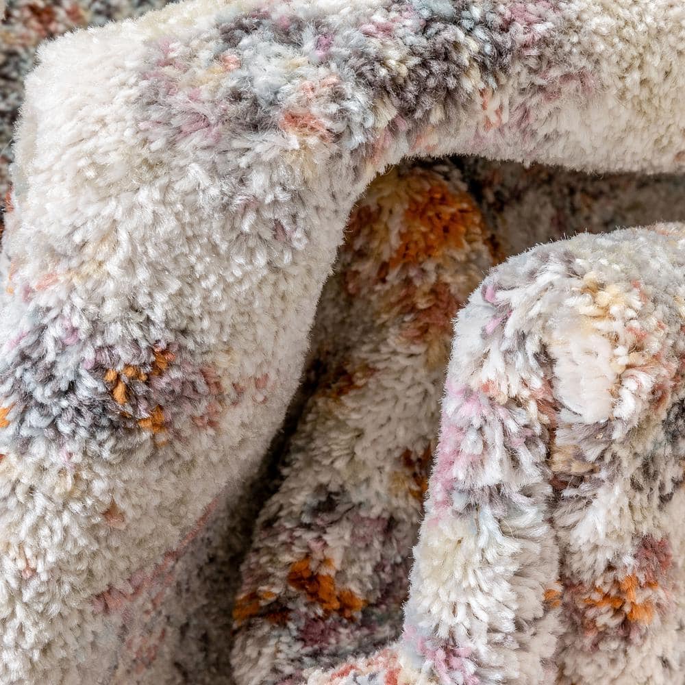 Ivory Floral Synthetic Reversible 5' x 7' Area Rug