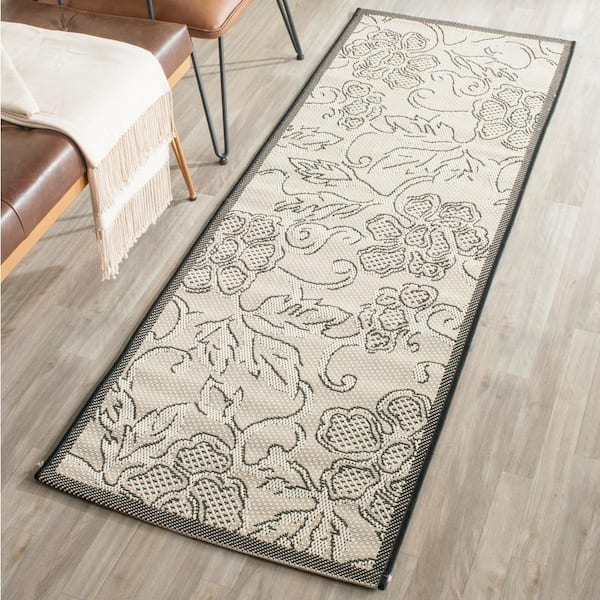 Courtyard Sand/Black 2 ft. x 7 ft. Floral Indoor/Outdoor Patio  Runner Rug