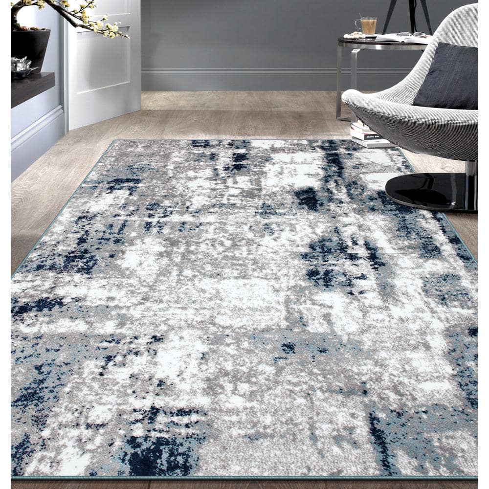 Abstract Blue Tufted Synthetic 7' 10" x 10' Area Rug