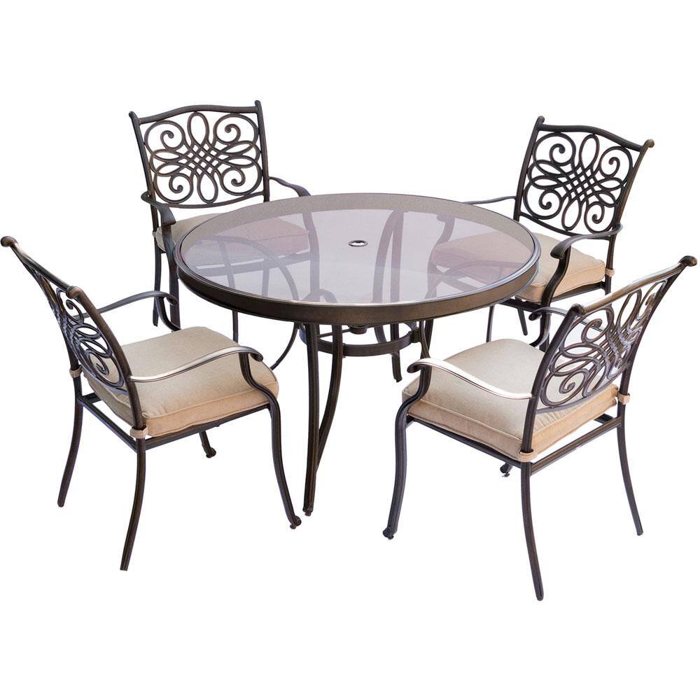 glass patio table with four chairs