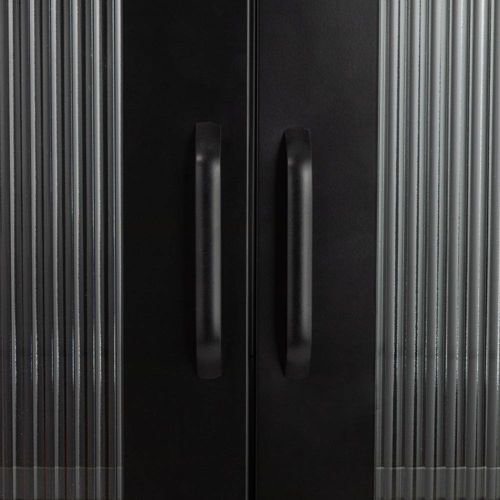 Close-up of the vertical ribbed texture on the black cabinet door.