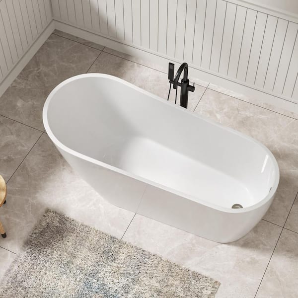 67 in. x 29.5 in. Freestanding Bathtub Acrylic Soaking Bathtub with Center Drain in White