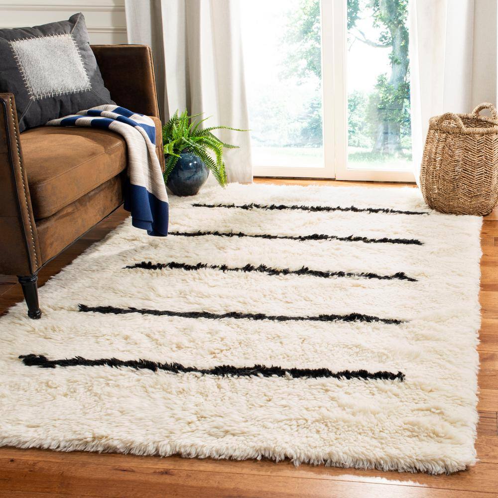 Elevated Black Hand-Knotted Pure Wool 9' x 12' Area Rug