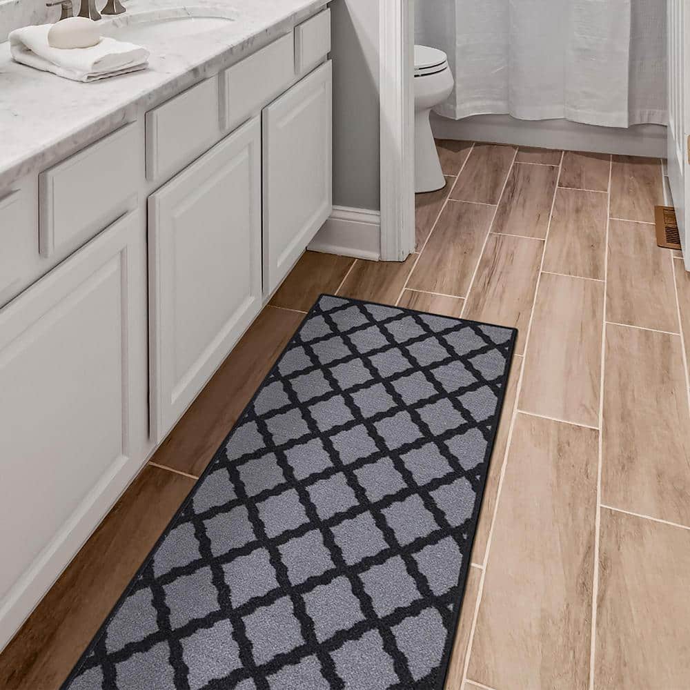https://images.thdstatic.com/productImages/df112d8f-57da-43ea-a31e-e61e7badb45b/svn/dark-gray-ottomanson-area-rugs-pnk7028-20x59-fa_1000.jpg