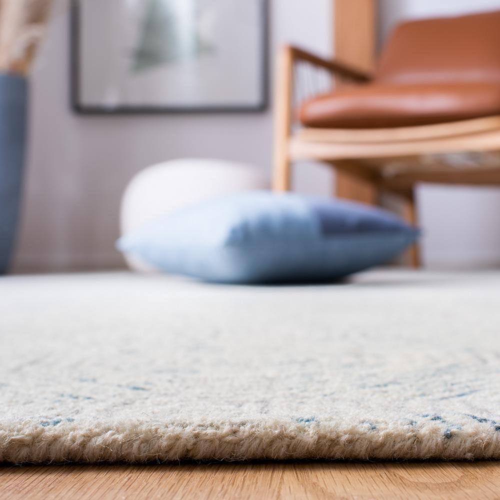 Handmade Light Blue Abstract Wool and Synthetic 4' x 6' Rug