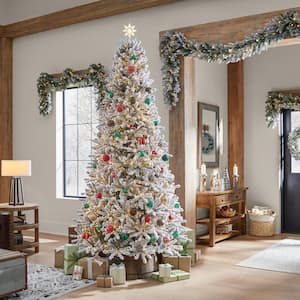 9 ft. Pre-Lit LED Starry Light Flocked Artificial Christmas Tree