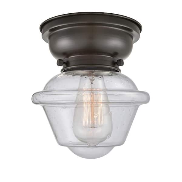Oxford 7.5 in. 1-Light Oil Rubbed Bronze Flush Mount with Seedy Glass Shade