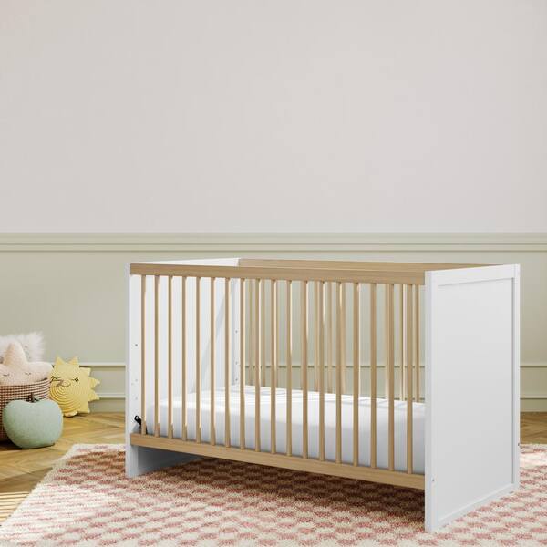 White crib 2025 with wood trim