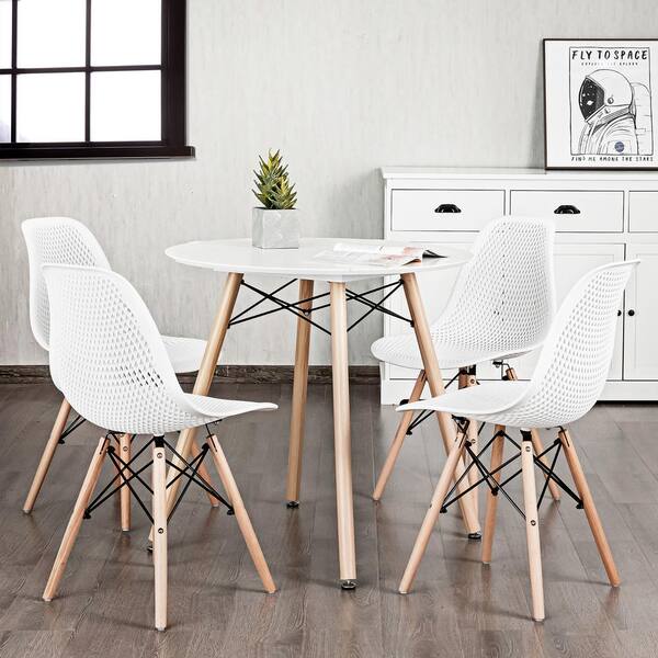 Costway Set of 4 Plastic Hollow Out Chair Mid Century Modern Wood Leg Seat White