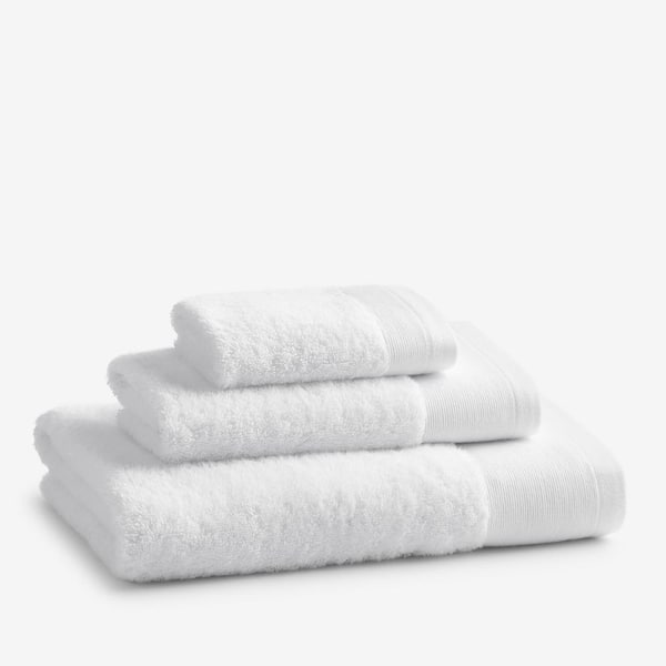 https://images.thdstatic.com/productImages/df92b115-b0f2-497f-8164-fb62f7a7e331/svn/white-the-company-store-bath-towels-vk19-wash-white-e1_600.jpg