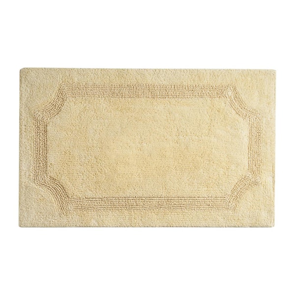 Laura Ashley Solid Reversible Yellow 17 in. x 24 in. Bath Mat