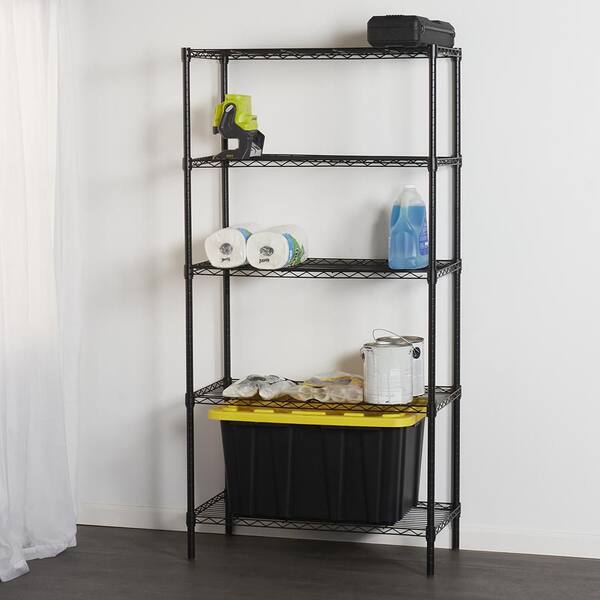 https://images.thdstatic.com/productImages/df9fedc9-03a2-46e0-8531-7fbfa162db5a/svn/black-home-basics-freestanding-shelving-units-hdc92709-31_600.jpg