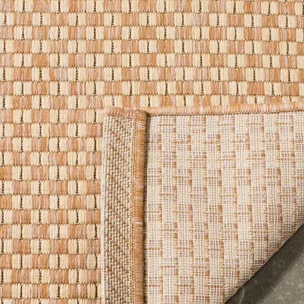 https://images.thdstatic.com/productImages/dfb182fb-6257-4ebc-99f0-243576589172/svn/natural-cream-safavieh-outdoor-rugs-cy8653-03021-2-c3_600.jpg