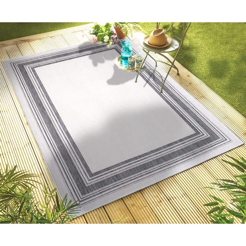 White Geometric Flat Woven Synthetic 5' x 7' Area Rug