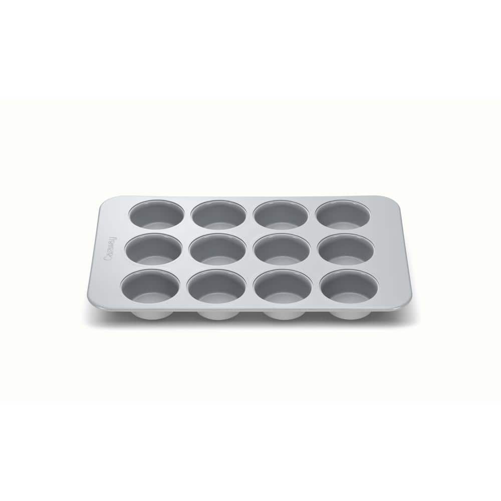 https://images.thdstatic.com/productImages/dfd58eac-3beb-42ca-a129-c5eb2904044d/svn/gray-caraway-home-cupcake-pans-muffin-pans-bw-mffn-gry-64_1000.jpg