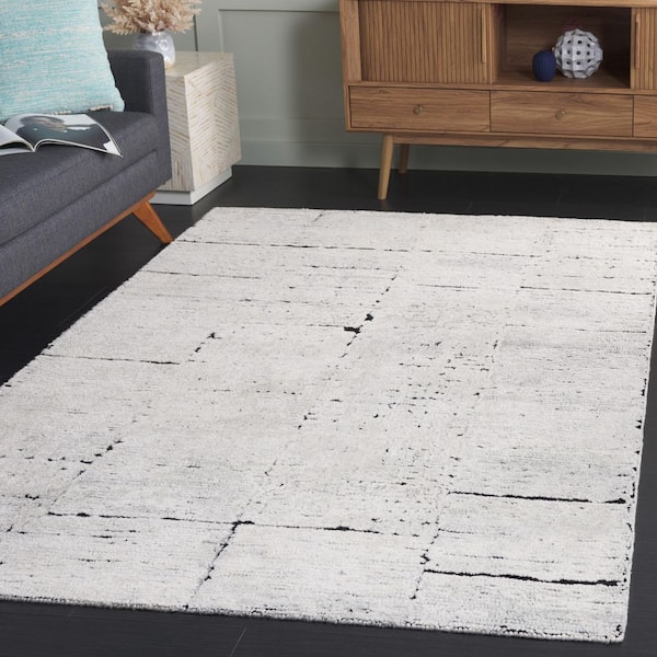 Kenya 5 ft. x 8 ft. Ivory/Black Distressed Abstract Area Rug