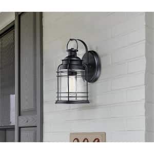 Kellen 1-Light Textured Black Finish Wall Mount Lantern with Clear Seeded Glass