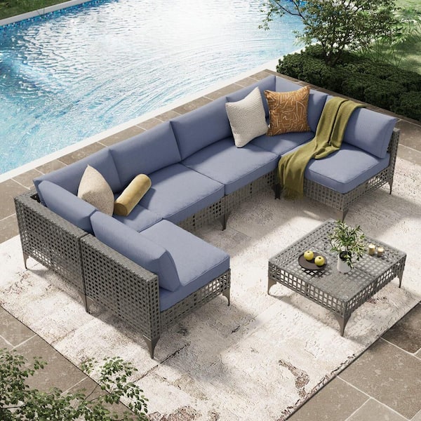 7-Piece Gray Metal Outdoor Sectional Set with Blue Cushions and Coffee Table