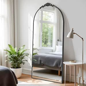 31.5 in. W x 71 in. H Modern Arched Removable Carved Flower Metal Framed Black Full-Length Floor Standing Mirror