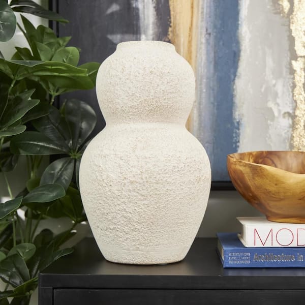 Litton Lane 15 in. Cream Hourglass Textured Ceramic Decorative Vase with Brown Distressing 045090