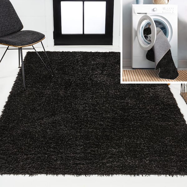 JONATHAN Y Black 5 ft. x 7 ft. Clayton Coastal Solid Glam Shag Machine-Washable Area Rug