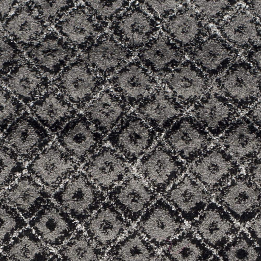 6' x 9' Black and Silver Synthetic Reversible Area Rug