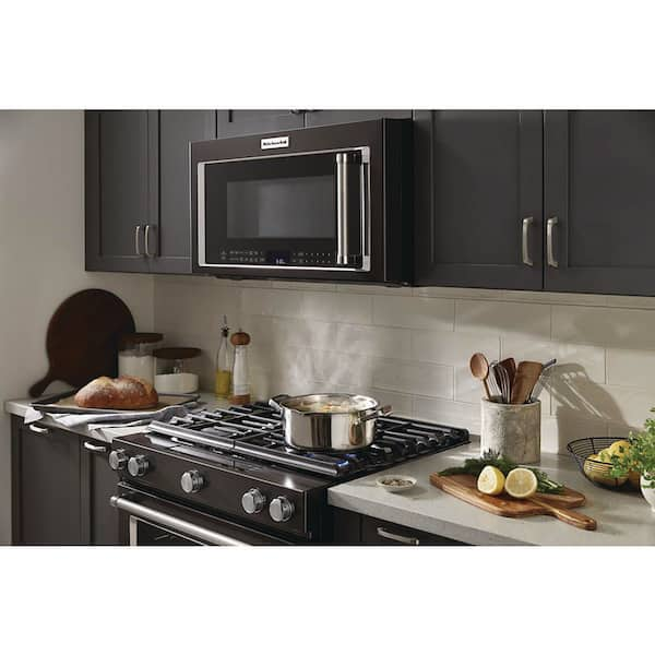 https://images.thdstatic.com/productImages/e05e05ed-f5f8-47f7-9df4-6db1cf9f6940/svn/black-stainless-steel-with-printshield-finish-kitchenaid-over-the-range-microwaves-kmhc319lbs-31_600.jpg