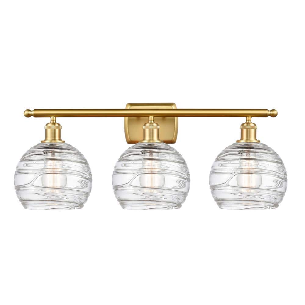 Athens Deco Swirl 26 in. 3-Light Clear Deco Swirl, Satin Gold Vanity Light with Clear Glass Shade price history on PriceWatchPro