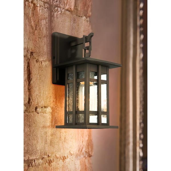 Arlington Creek 5.39 in. W x 10.87 in. H 1-Light Matte Bronze Outdoor Wall Lantern Sconce Clear Seedy Glass Panels
