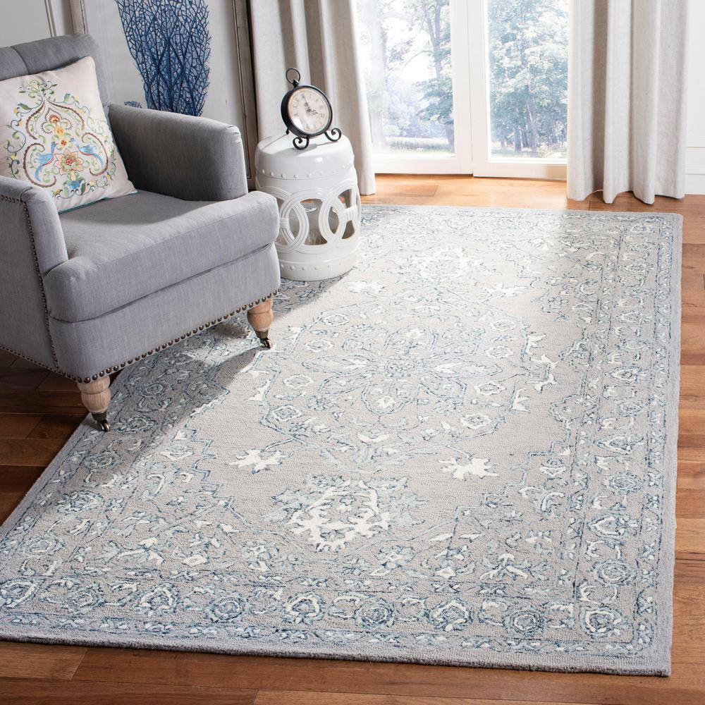 Light Grey and Ivory Wool Tufted 4' x 6' Area Rug