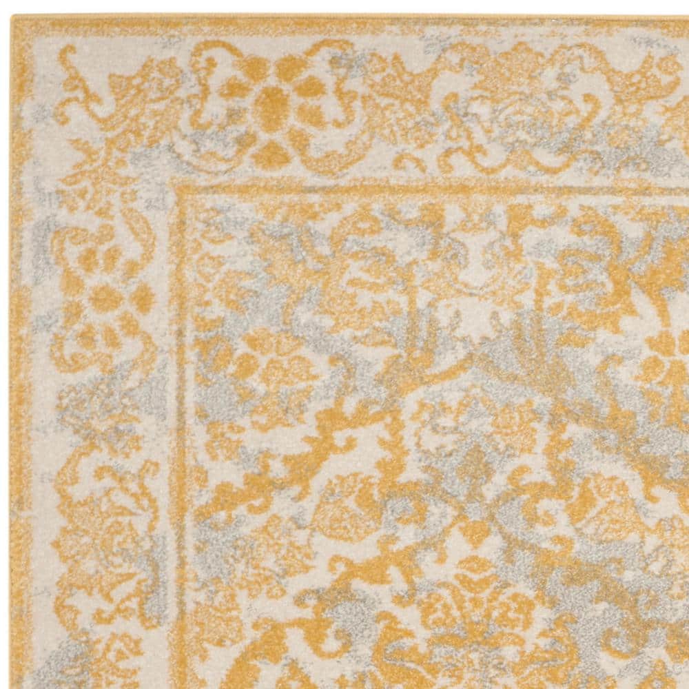Ivory and Gold Reversible Synthetic Area Rug, 4' x 6'