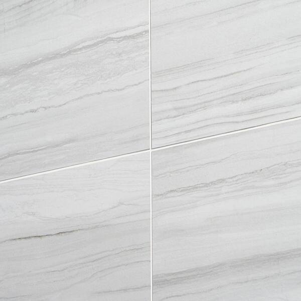 Anatolia Tile Statuario Polished 12-in x 24-in Porcelain Marble Tile (Common: 12-in x 24-in; Actual: 11.81-in x 23.62-in) Anatolia Tile Statuario Polished 12-in x 24-in Porcelain Marble Tile (Common: 12-in x 24-in; Actual: 11.81-in x 23.62-in)