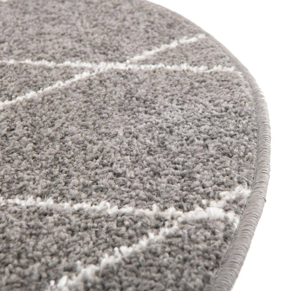 Trellis Frieze Dark Gray and Ivory Oval Synthetic Area Rug