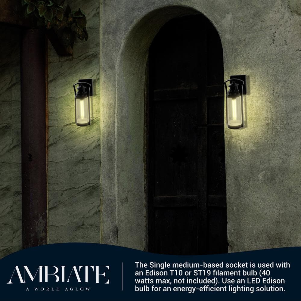 Medium Black Steel Cylinder Outdoor Wall Sconce with Clear Glass Shade