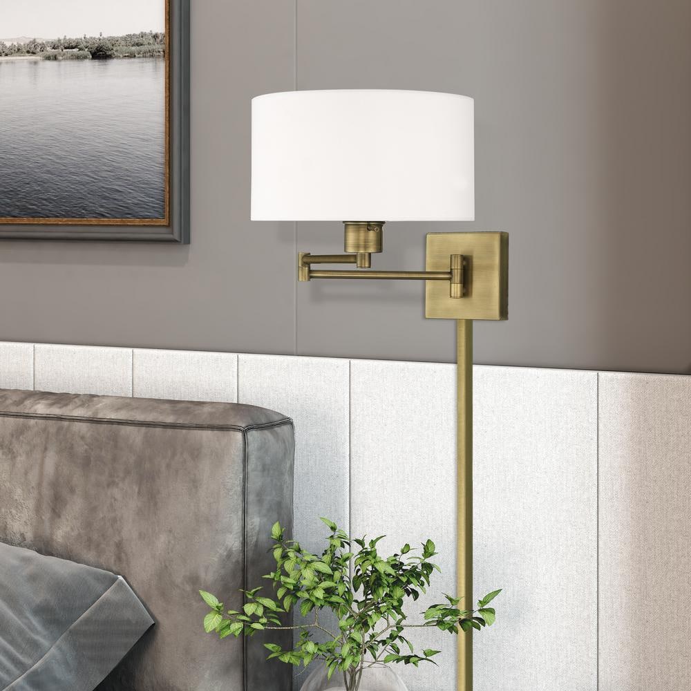 Antique Brass Swing Arm Wall Lamp with Off-White Fabric Shade