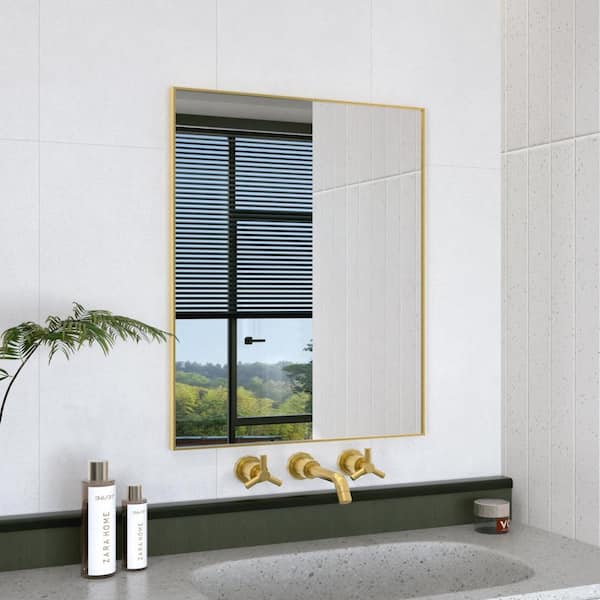 Hermitage Bath Oblivion 24 in. W. x 30 in. H Rectangular Framed Wall Bathroom Vanity Mirror in Brass