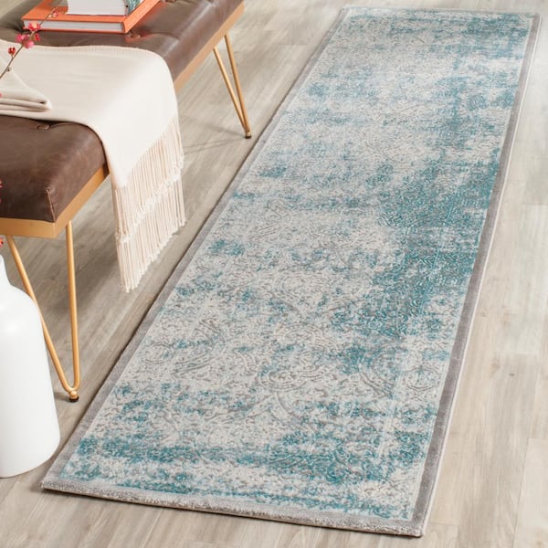 Passion 2 ft. x 20 ft. Turquoise/Ivory Distressed Border Runner Rug