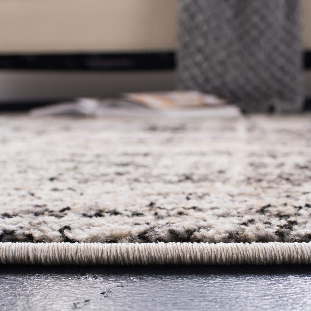 Silver/Black 9' x 12' Abstract Synthetic Rectangular Area Rug
