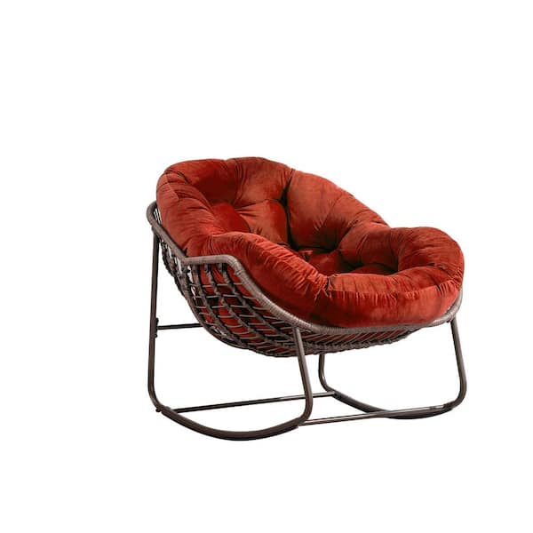 Brown Wicker Outdoor Rocking Chair with Orange Cushions