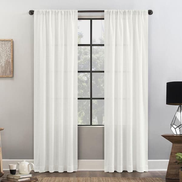 CLEAN WINDOW Kelsi Waffled Cotton Blend 52 in. W x 96 in. L Light Filtering Rod Pocket Curtain Panel in White
