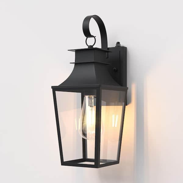 Hawaii 16 in. H Black Clear Glass Hardwired Outdoor Wall Lantern Sconce with Dusk to Dawn