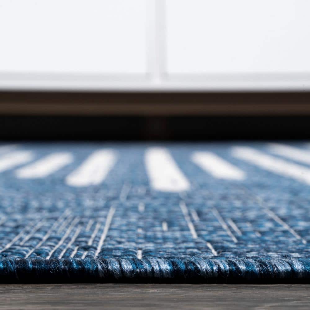 Bohemian Stripe Blue and Ivory Synthetic Area Rug 5' x 8'