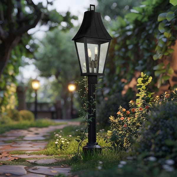 Chateau Grande 4-Light Black and Burnt Gold Outdoor Post Lantern with Clear Glass