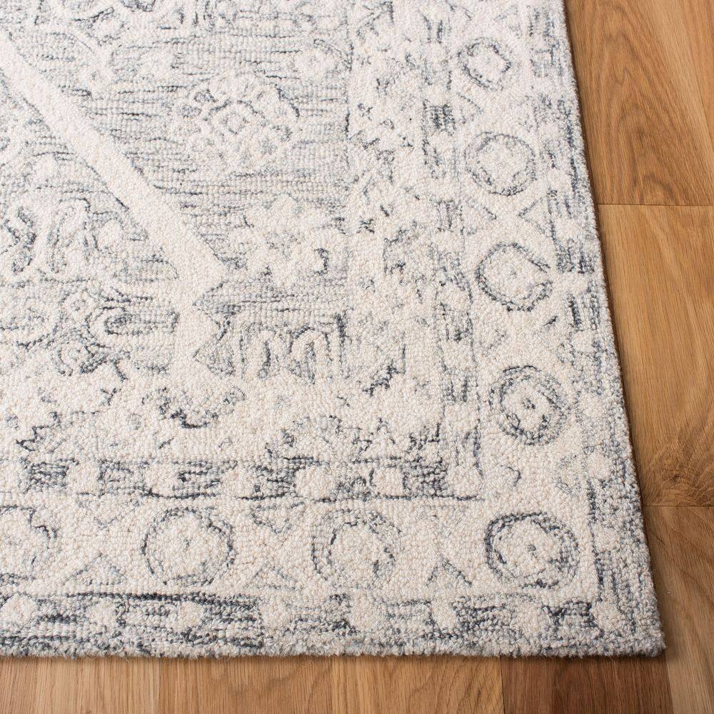 Ivory Elegance 10' x 14' Handmade Wool Tufted Rug