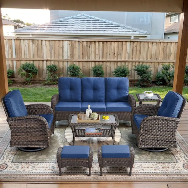 Brown 7-Piece Wicker Patio Conversation Set with Swivel Rockers, Outdoor Sofa Seating Set with Olefin Navy Blue Cushions
