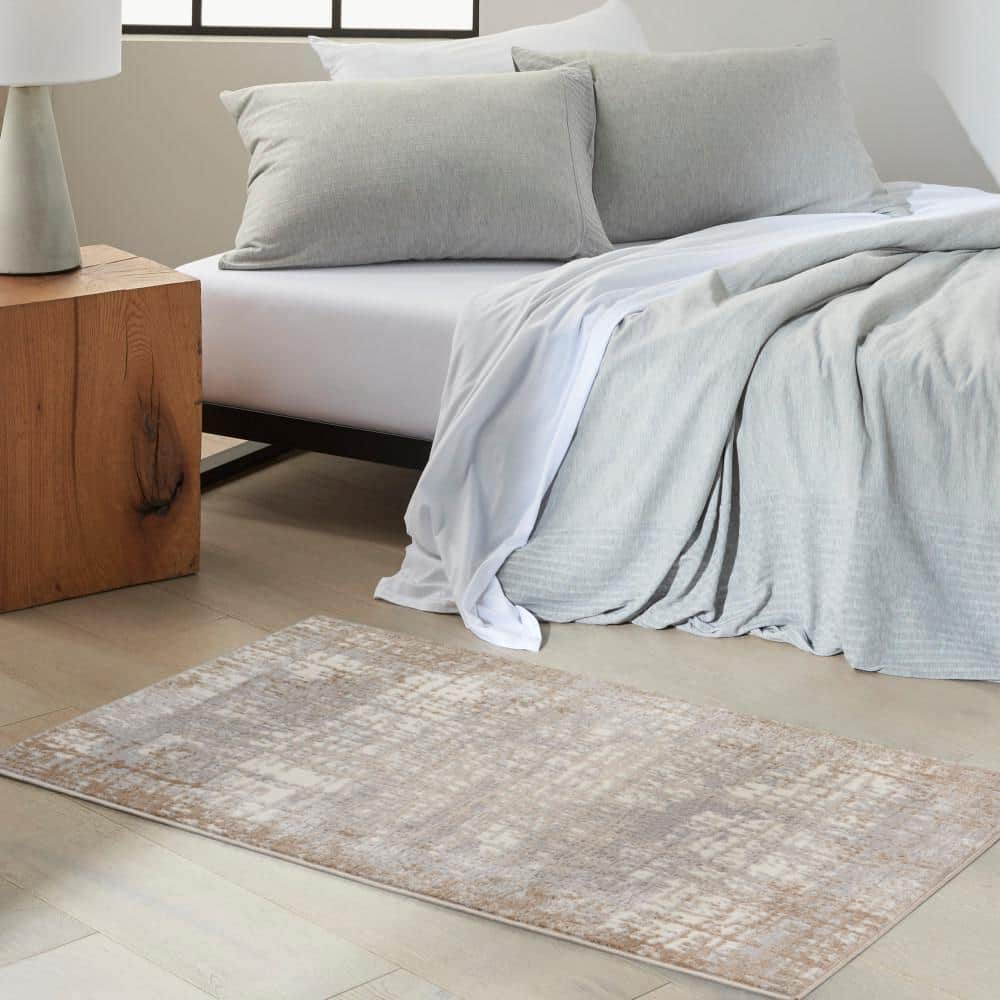 Ivory and Taupe Abstract Rectangular Synthetic Rug, 3'2" x 5'