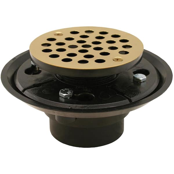 JONES STEPHENS 2 in. x 3 in. ABS Shower Drain/Floor Drain with 4 in. Polished Brass Round Strainer-Fits Over 2 in. Sch. 40 DWV Pipe